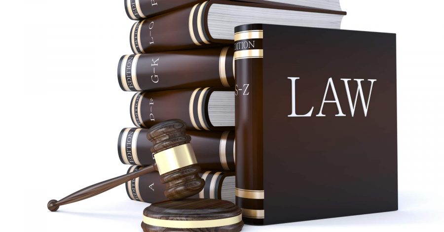 A stack of law books and a gavel