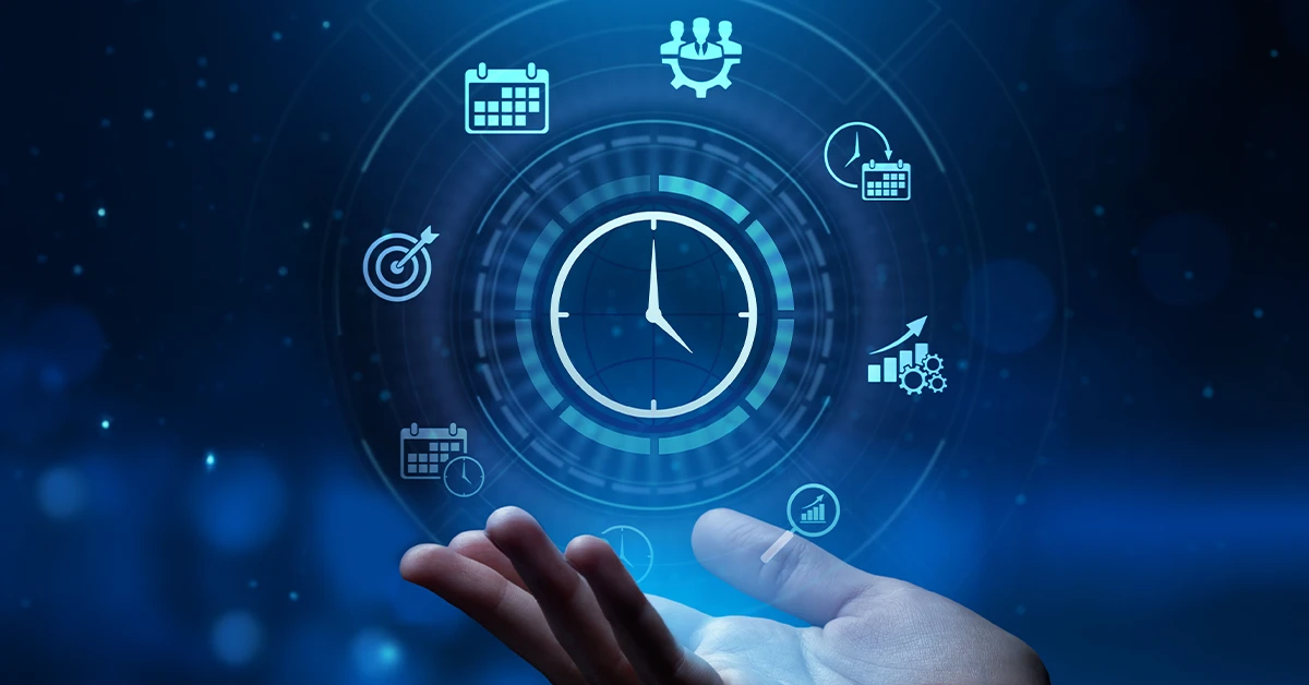 A person's hand is holding a glowing blue circle with various icons related to time management, including a clock, calendar, and graph.